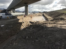 December 2019 – A construction worker operating a water pump near the freeway. For more information call (619) 688-6670 or email CT.Public.Information.D11@dot.ca.gov