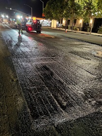 Caltrans worker spraying sealer on roadway for pavement and ADA improvements on State Route 82 El Camino Real; between south of State Route-237; Mountain View to Sand Hill Road; Menlo Park/Palo Alto.