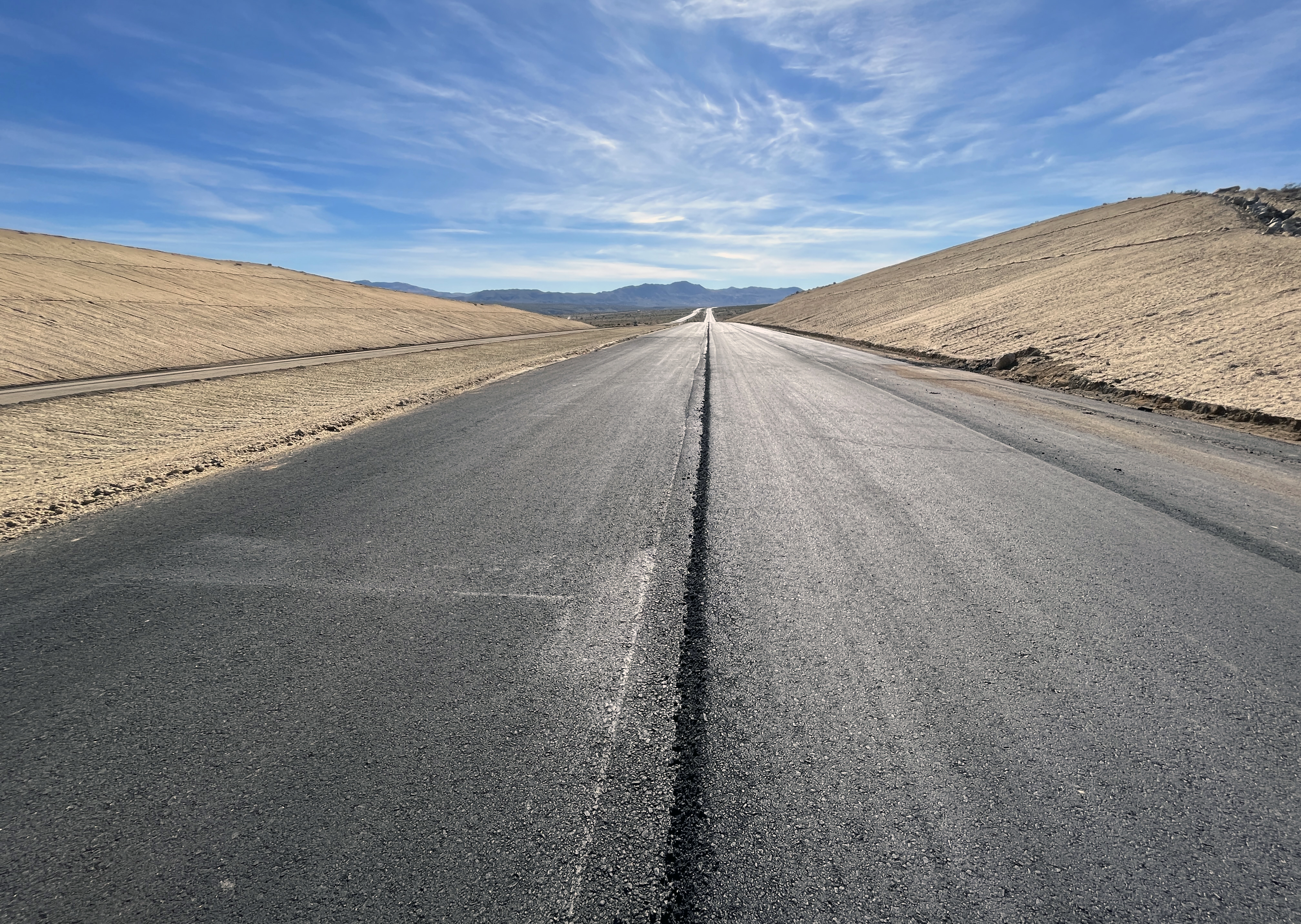 Crews have begun paving on the south end of the Olancha Cartago Project.