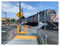 Pedestrian Gate; new signage; detectable warning tiles (Main Street; Redwood City; San Mateo County)