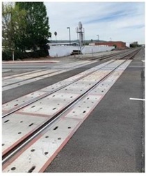 Concrete panels along tracks is covered under the Section 130 Program