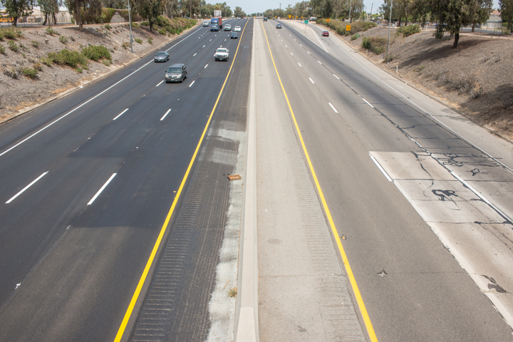 Photo looking down on new asphalt on highway 99 near Delano.